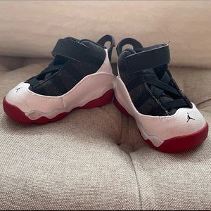 Used Red and White Jordan 6 Rings. Size 4.